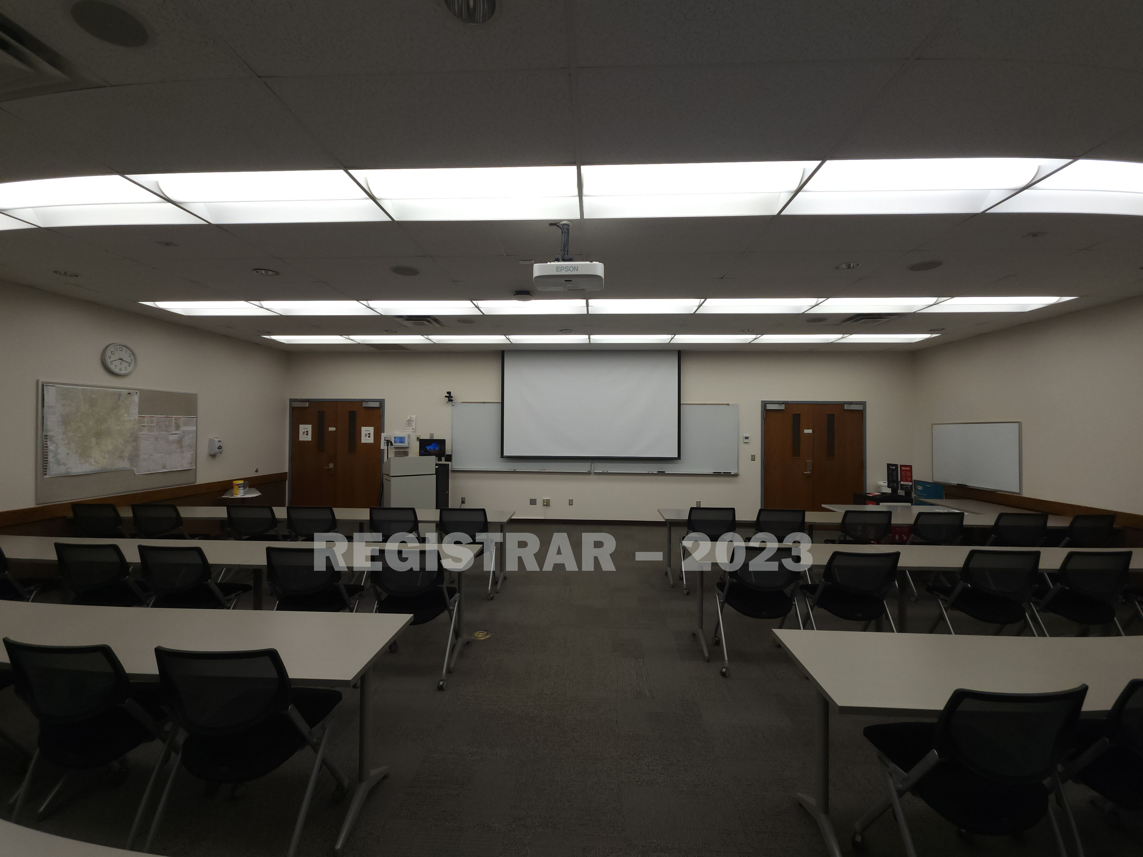 Derby Hall room 1080 ultra wide angle view from the back of the room with projector screen down