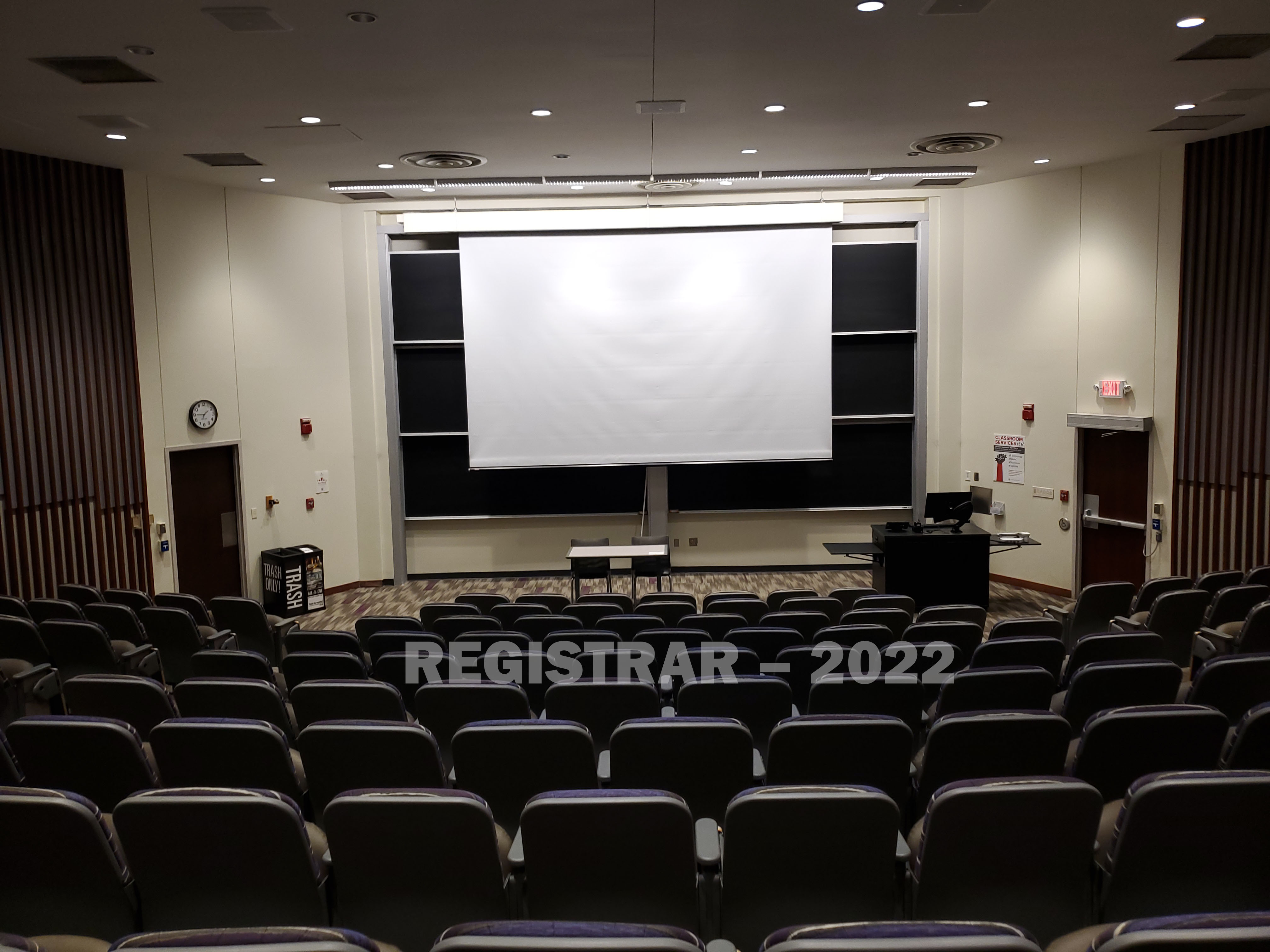 209 West Eighteenth Avenue room 160  view from back of room with projector screen down