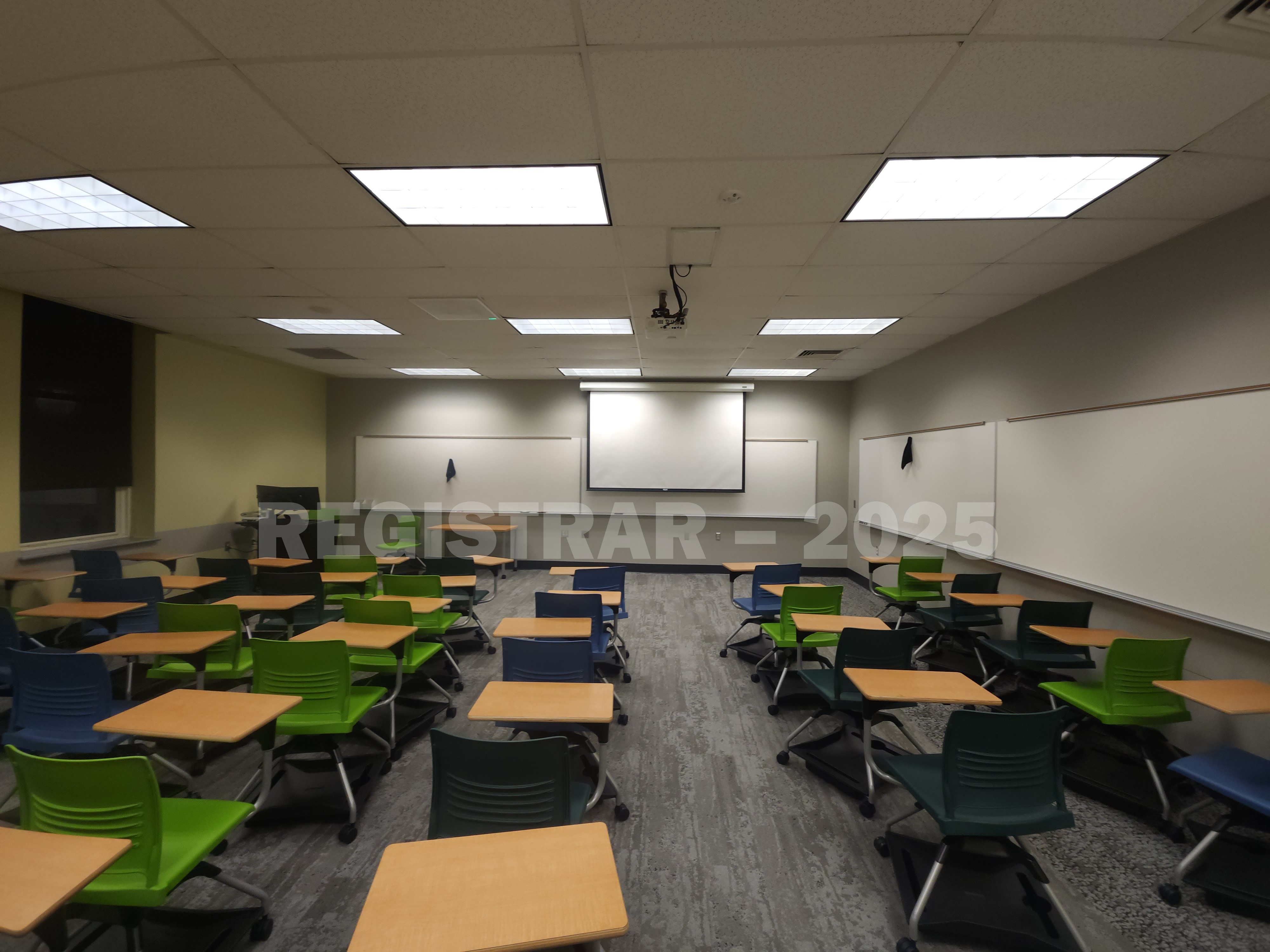 Mendenhall Laboratory room 131  ultra wide angle view from the back of the room with projector screen down