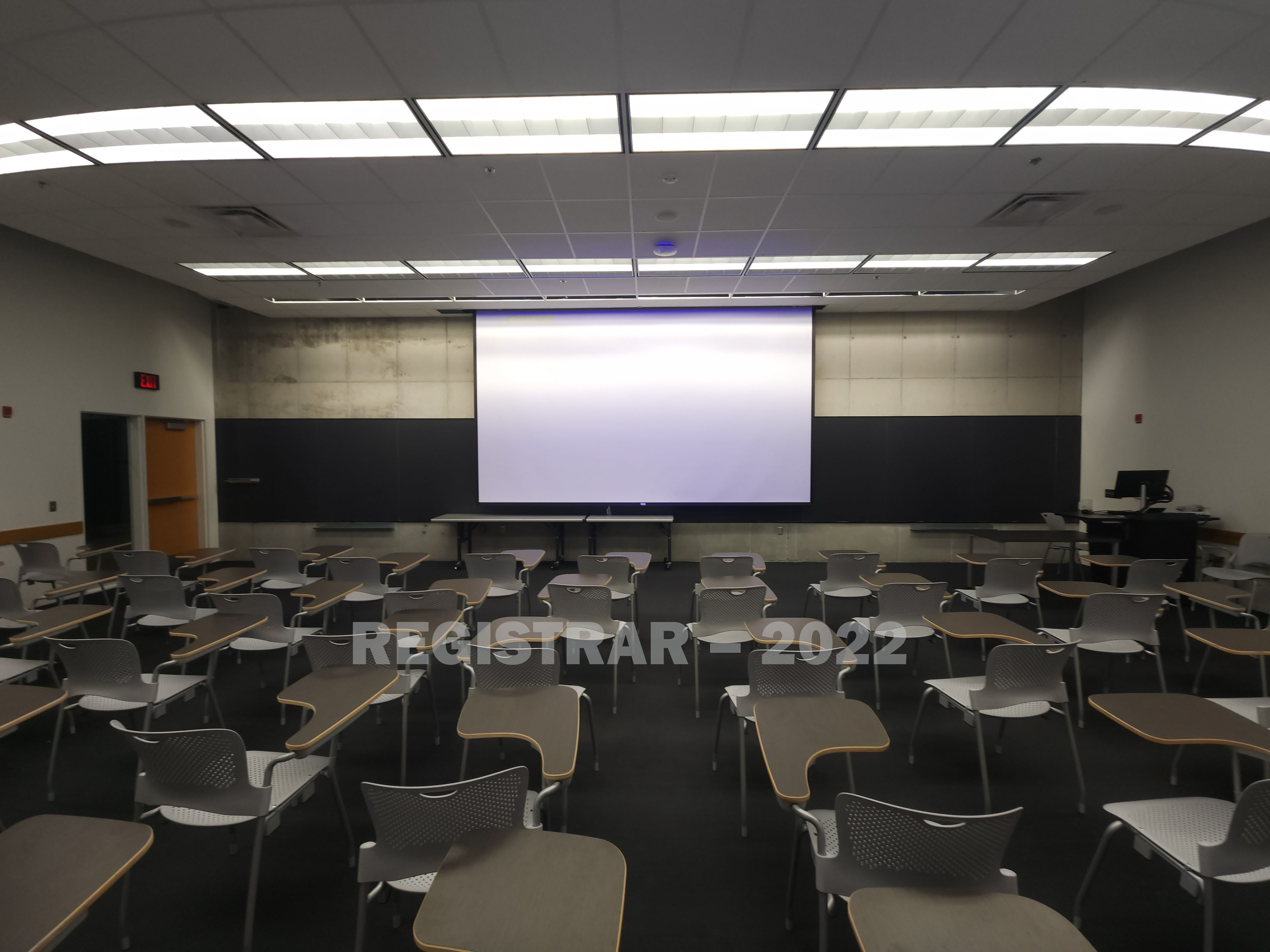 Knowlton Hall room 190 ultra wide angle view from the back of the room with projector screen down