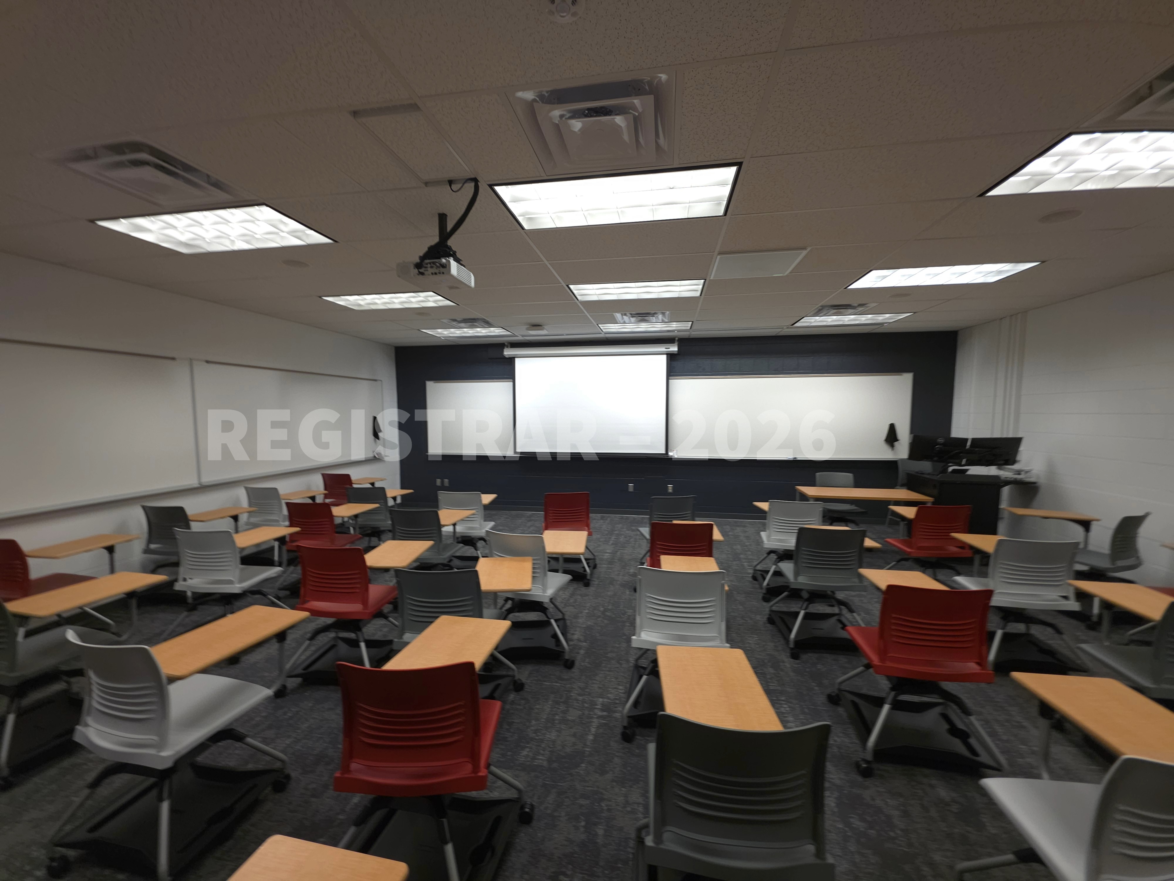 University Hall room 38 back of room projection screen down ultra wide angle view