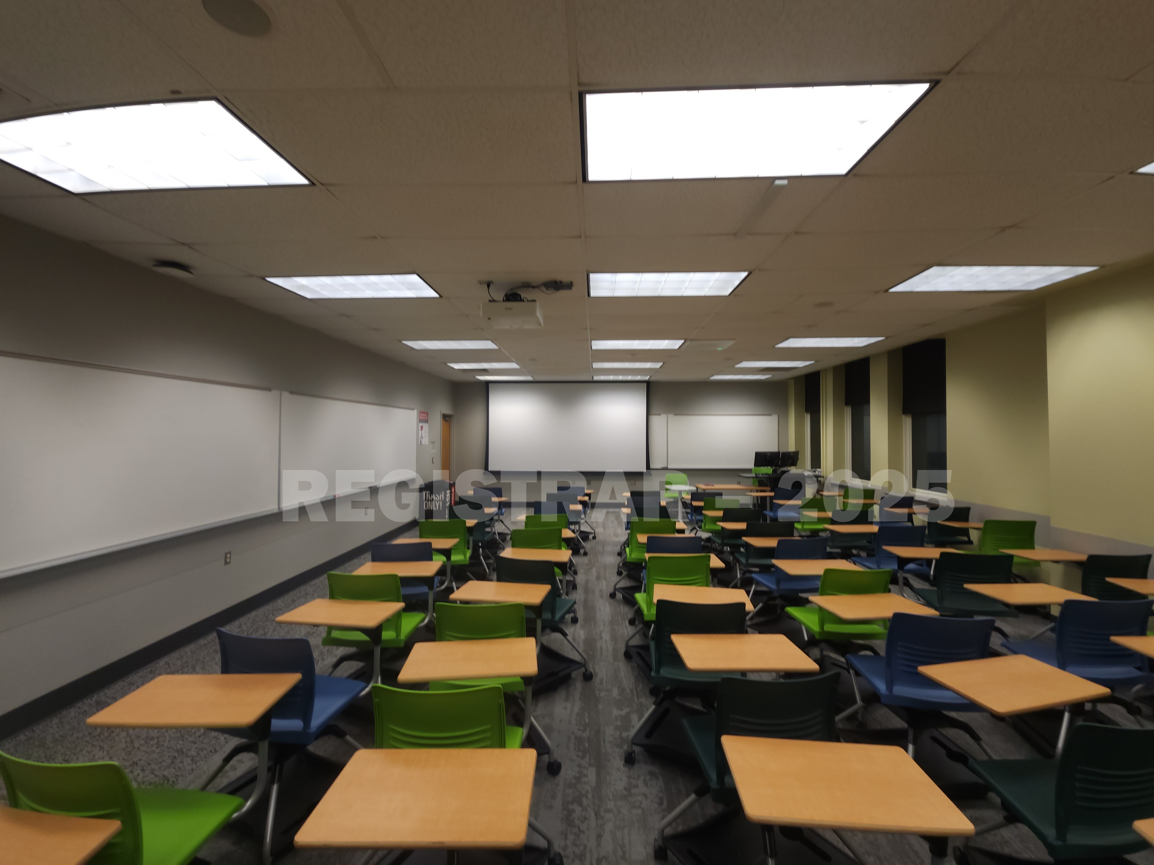 Mendenhall Laboratory room 115  ultra wide angle view from the back of the room with projector screen down