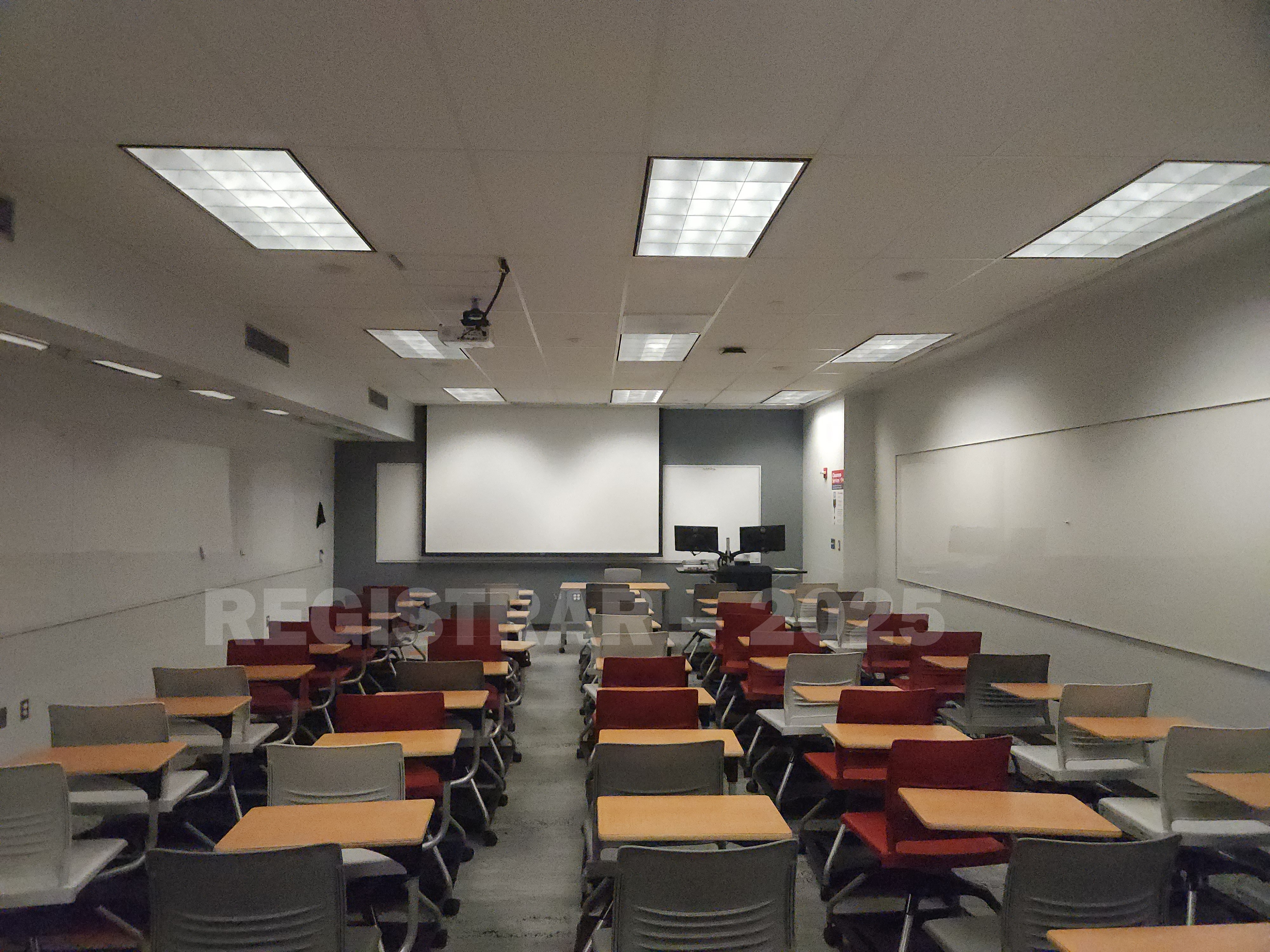 McPherson Chemical Lab room 2017 view from the back of the room with the projector screen down