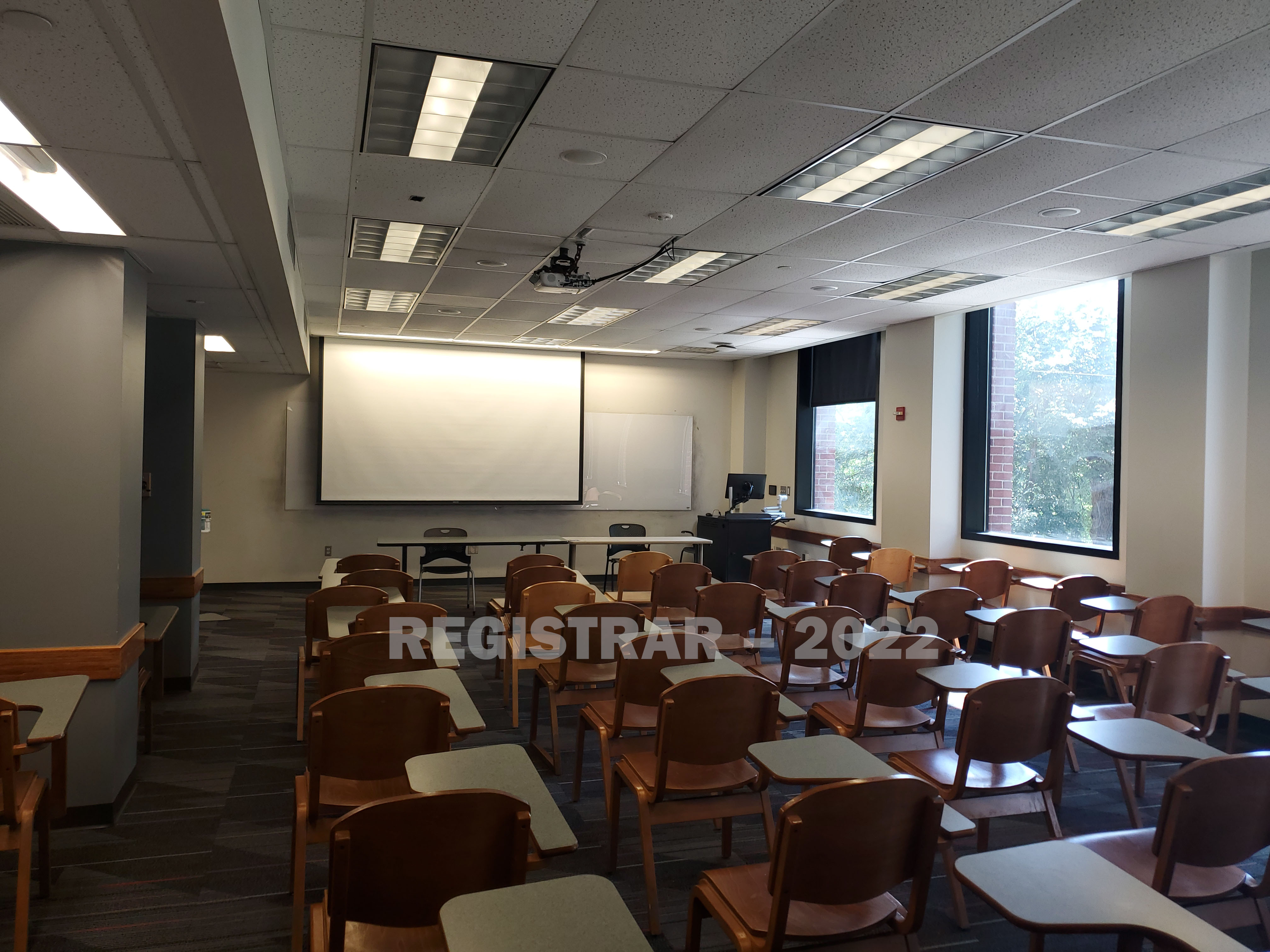 McPherson Chemical Lab room 2019 view from the back of the room with projector screen down
