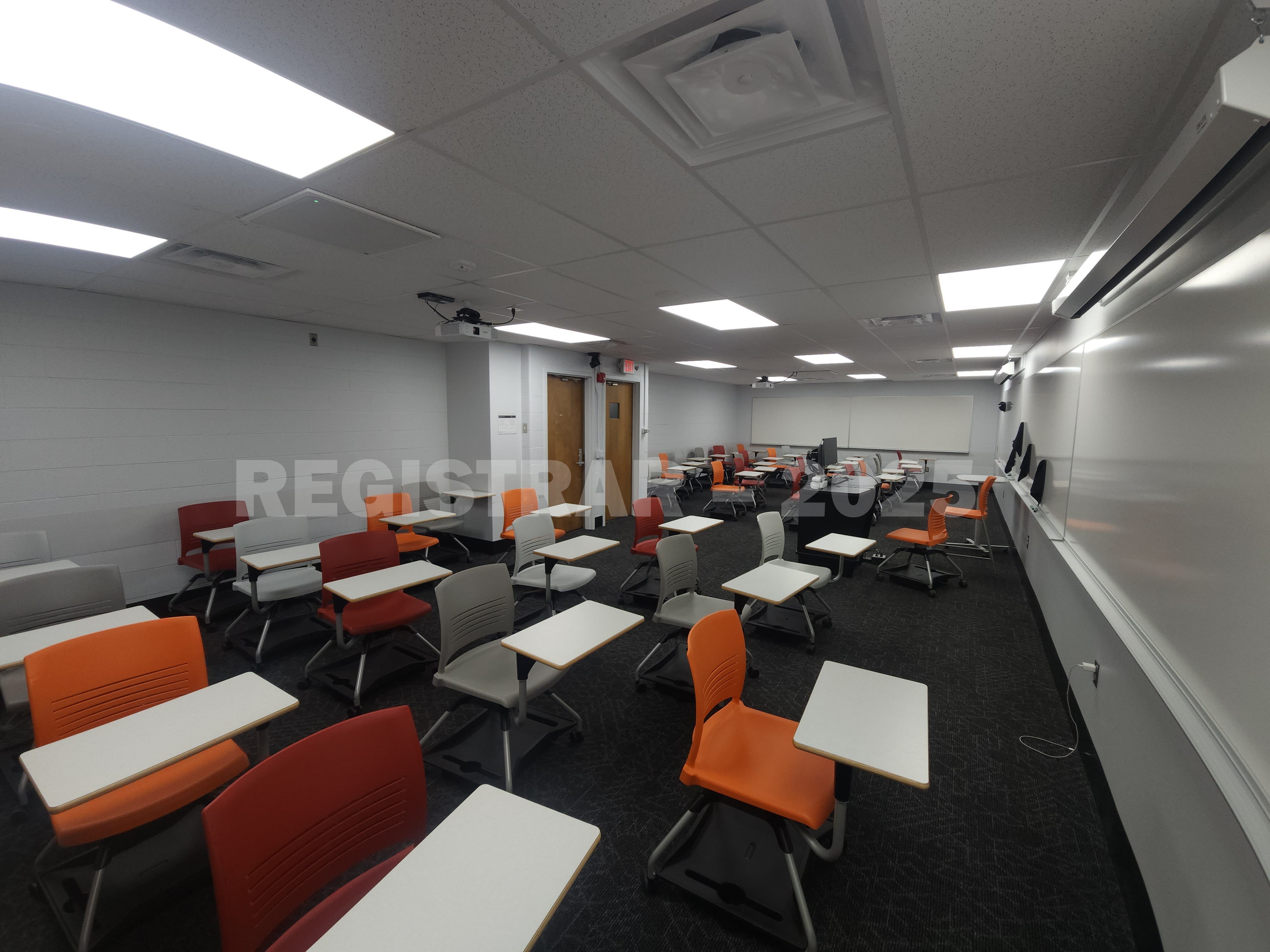 Journalism Building room 221 ultra wide angle view from the front of the room