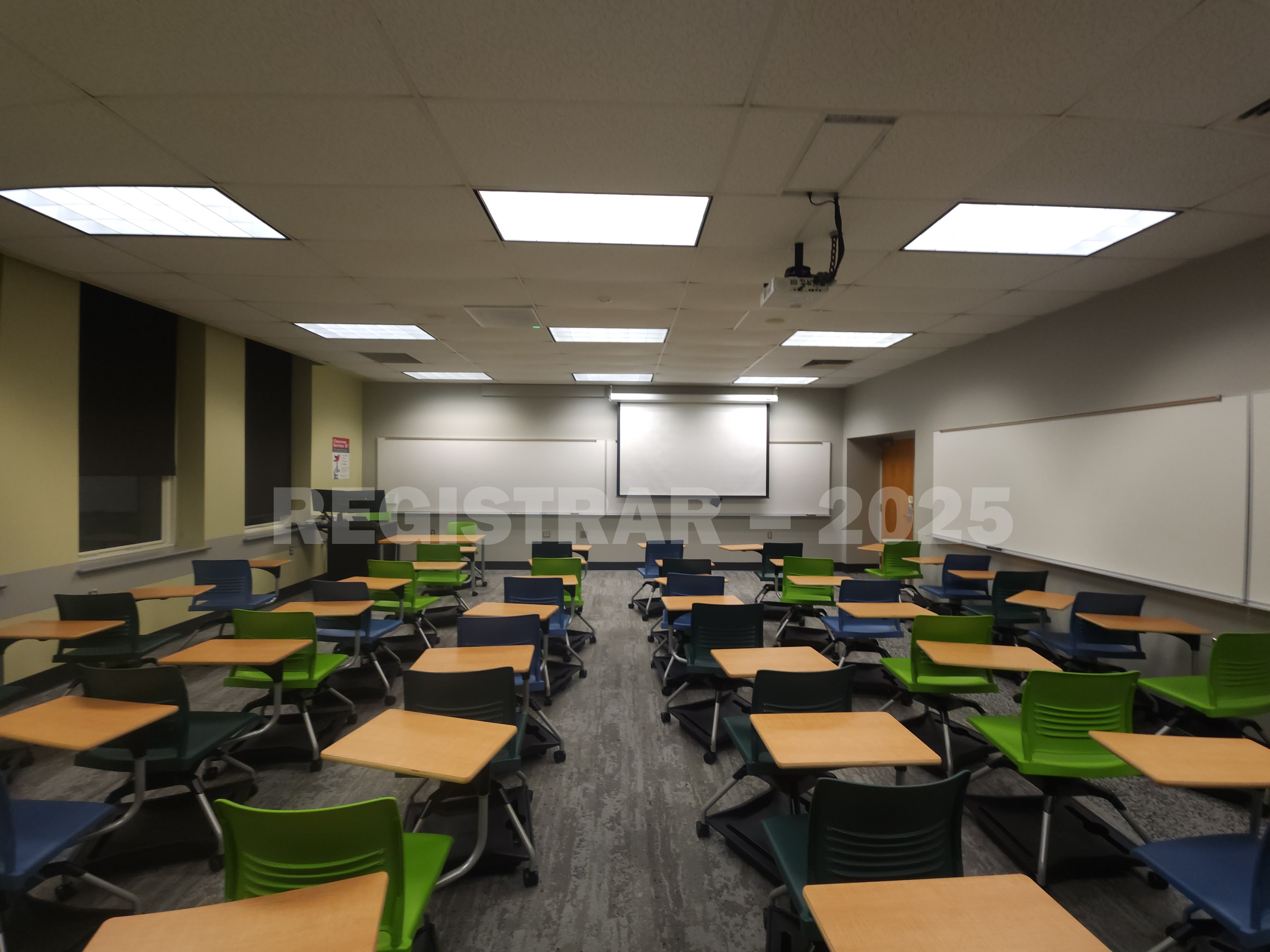 Mendenhall Laboratory room 125  ultra wide angle view from the back of the room with projector screen down