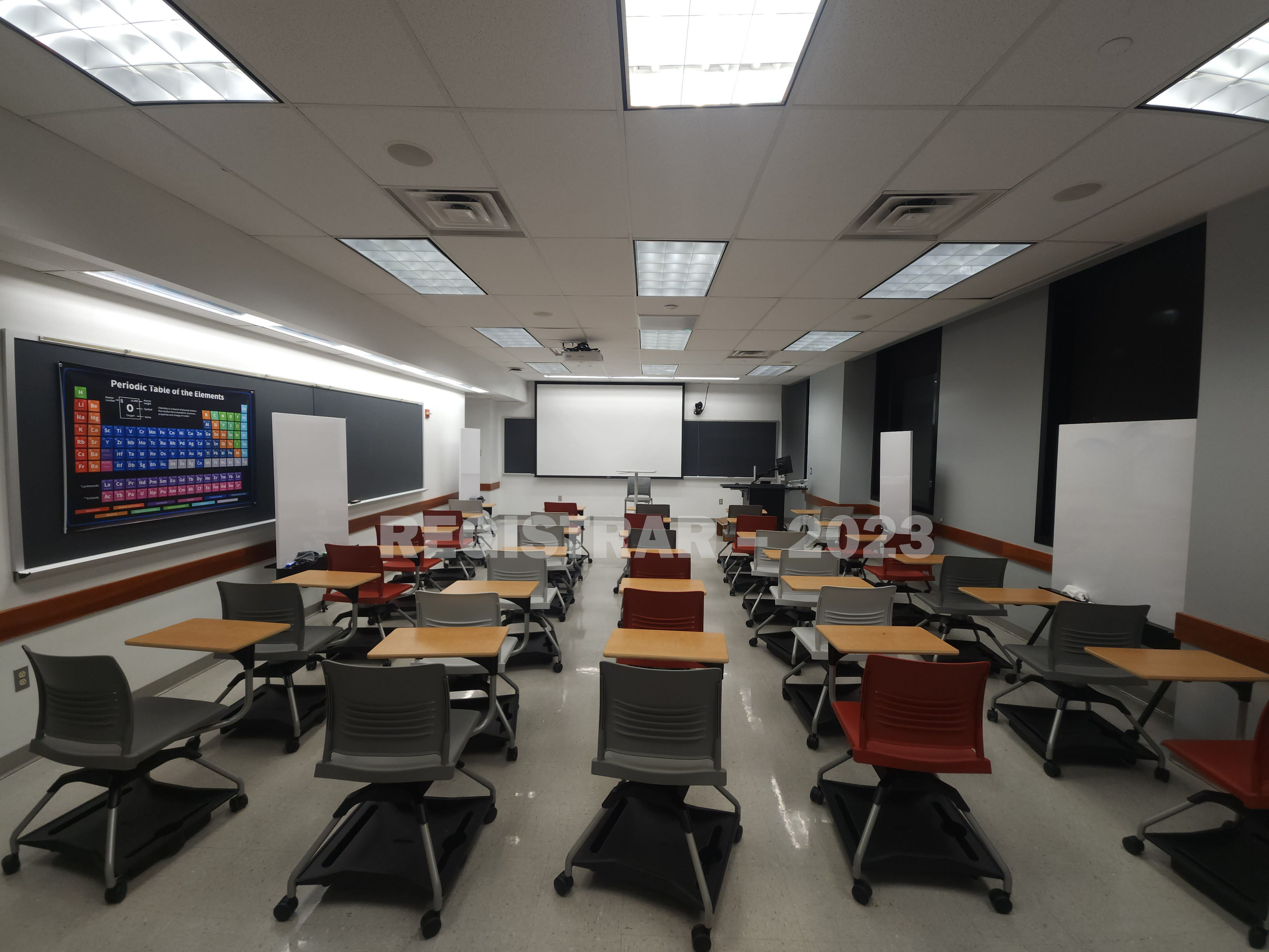 McPherson Chemical Lab room 1046 ultra wide view from the back of the room with projection screen down